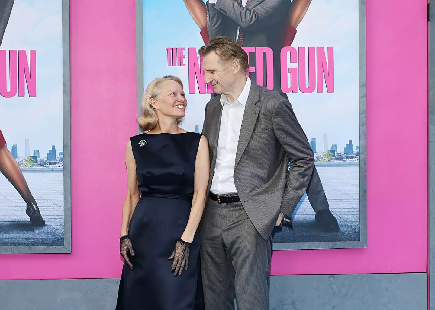 Pamela Anderson and Liam Neeson have been facing rumors since they starred in The Naked Gun (Dia Dipasupil/Getty Images)