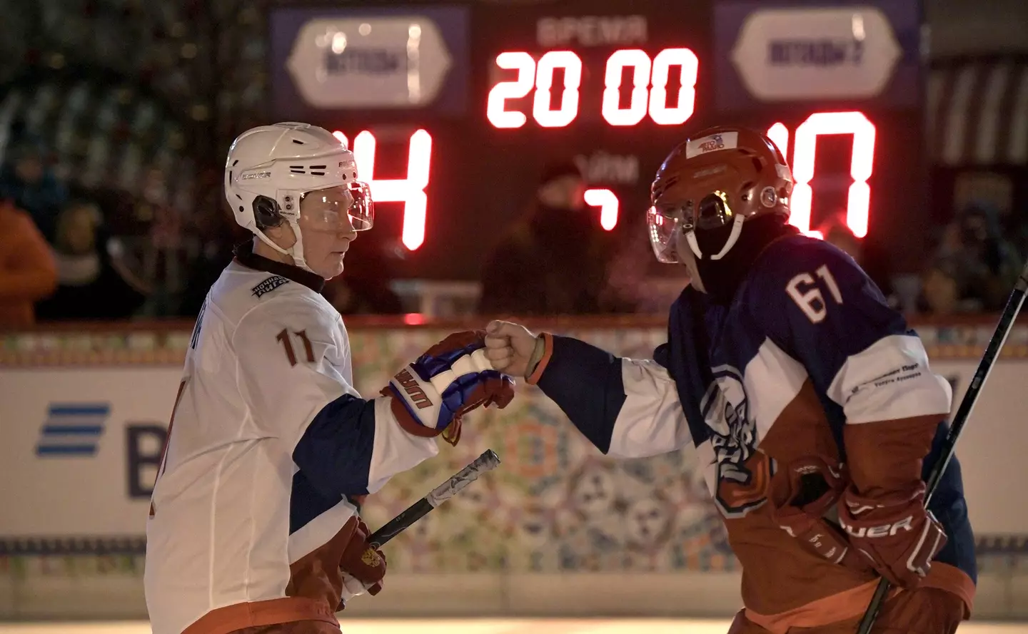 Putin and Potanin during an ice hockey tournament.