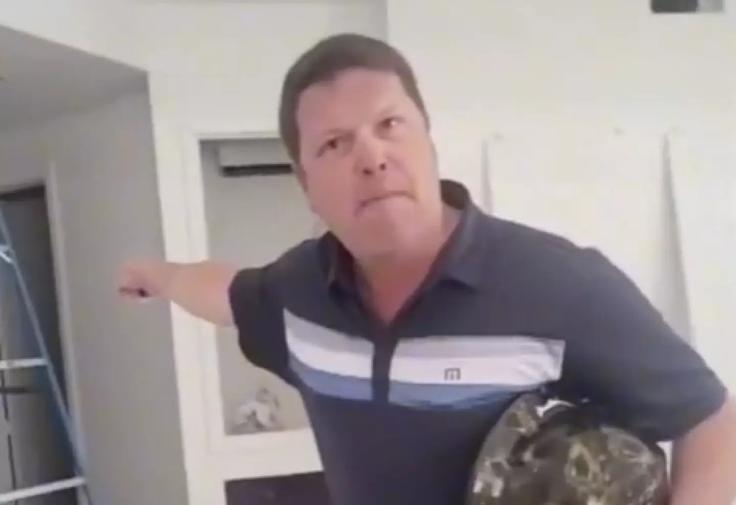 The man was filmed swearing at his staff and slapping a female employee.