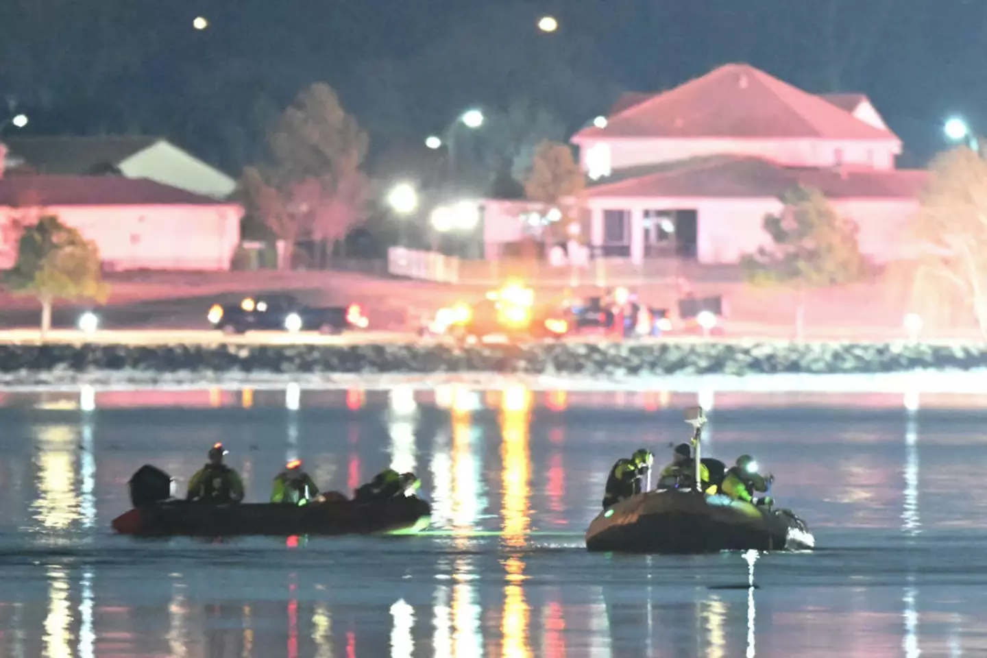 Rescue boats search the waters of the Potomac River for survivors, and to recover bodies (ANDREW CABALLERO-REYNOLDS/AFP via Getty Images)