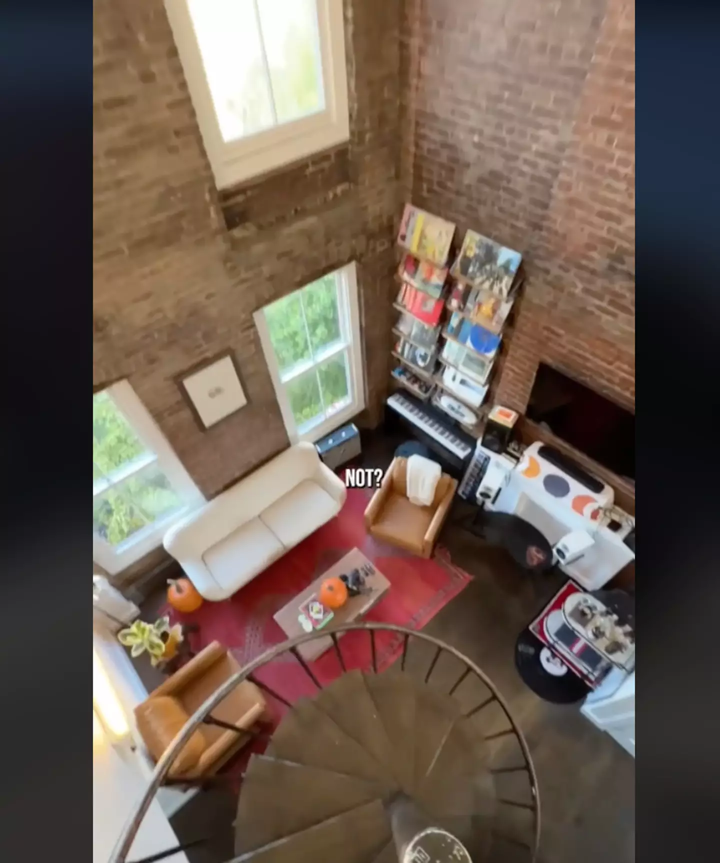 The West Village home has a vinyl wall.