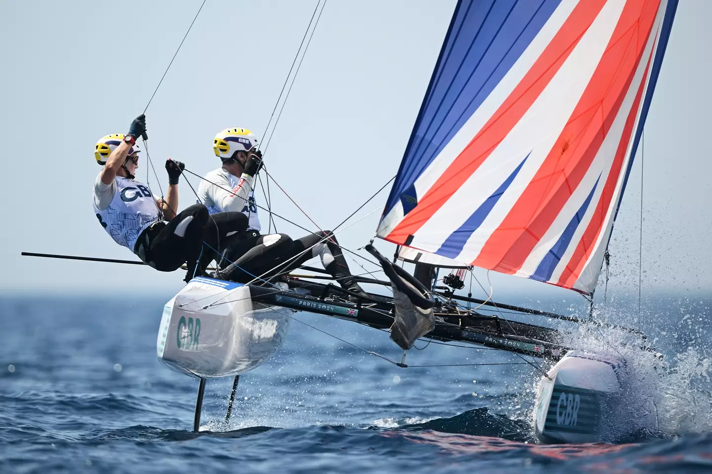 John Gimson and Anna Burnet were disqualified before the mixed multihull event began. (Clive Mason/Getty Images)