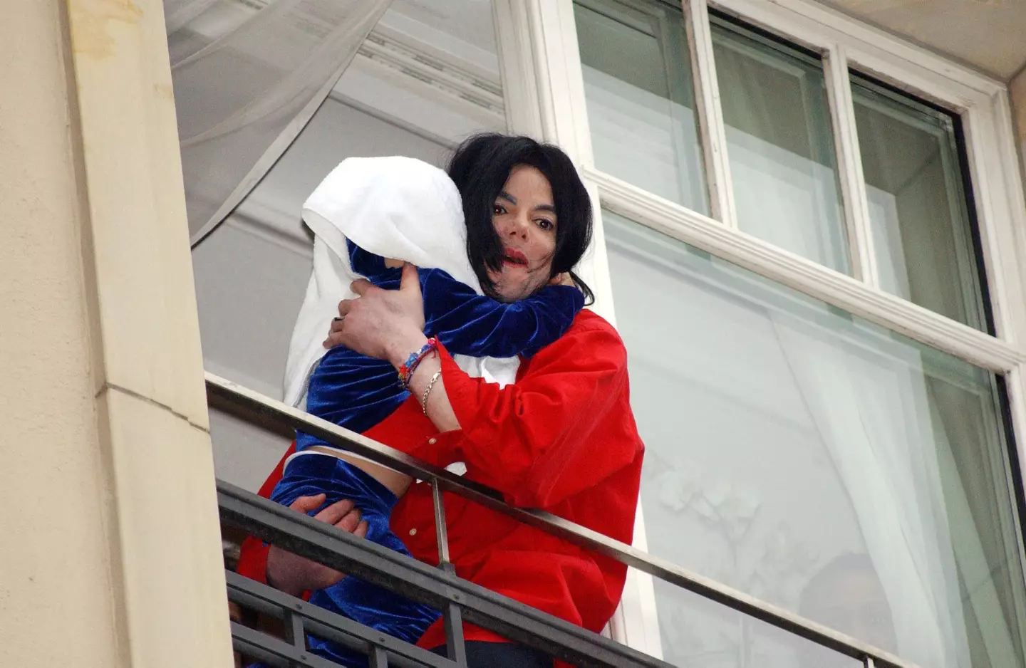 Michael Jackson would sometimes be spotted with one of his children but them wearing something over their head (Olaf Selchow/Getty Images)