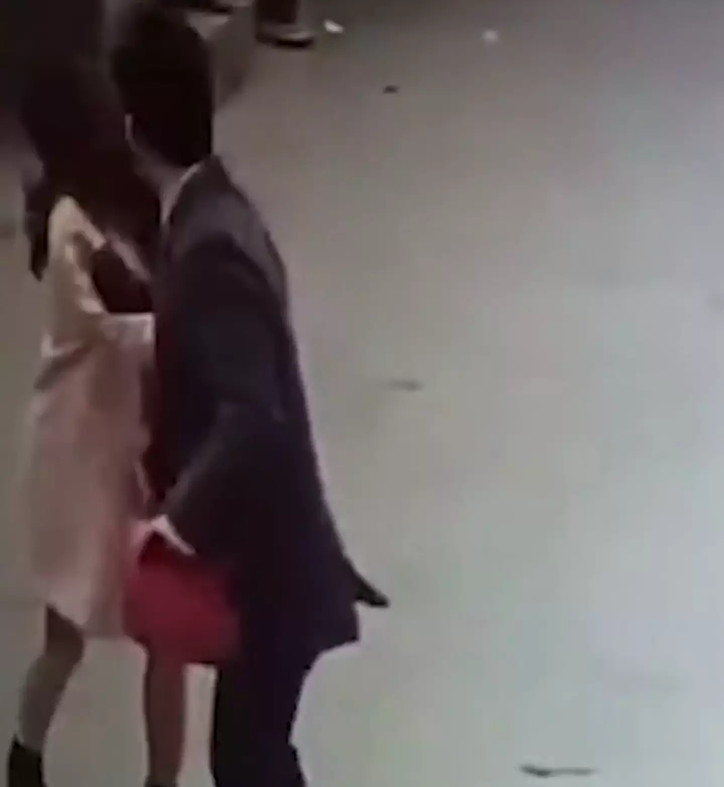 The woman can be seen getting beaten up by the angry merchant. (Asia Wire)