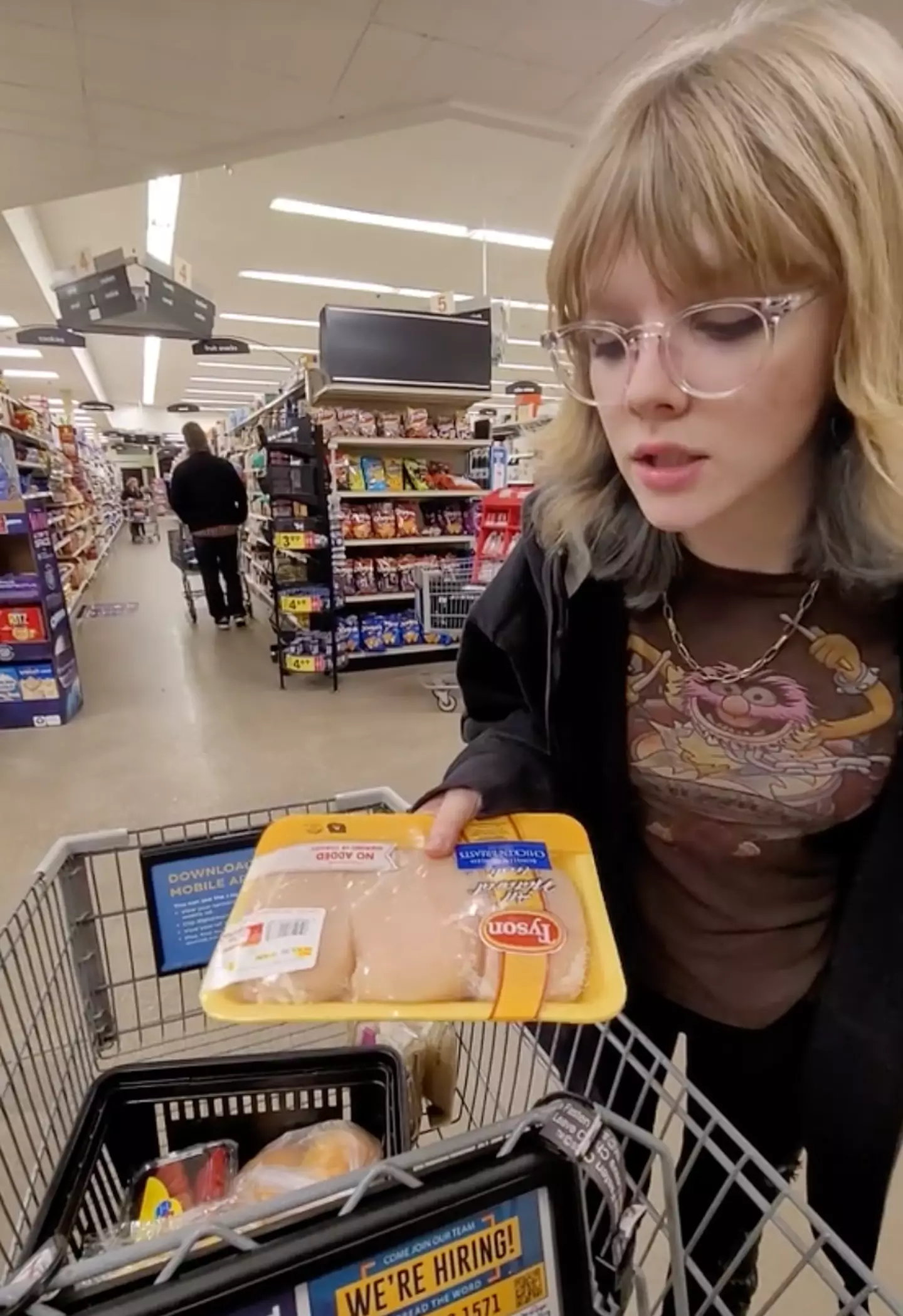 Amber's daughter realized that she's struggled to afford chicken from the store on her current salary. (@amberrae_2015/TikTok)