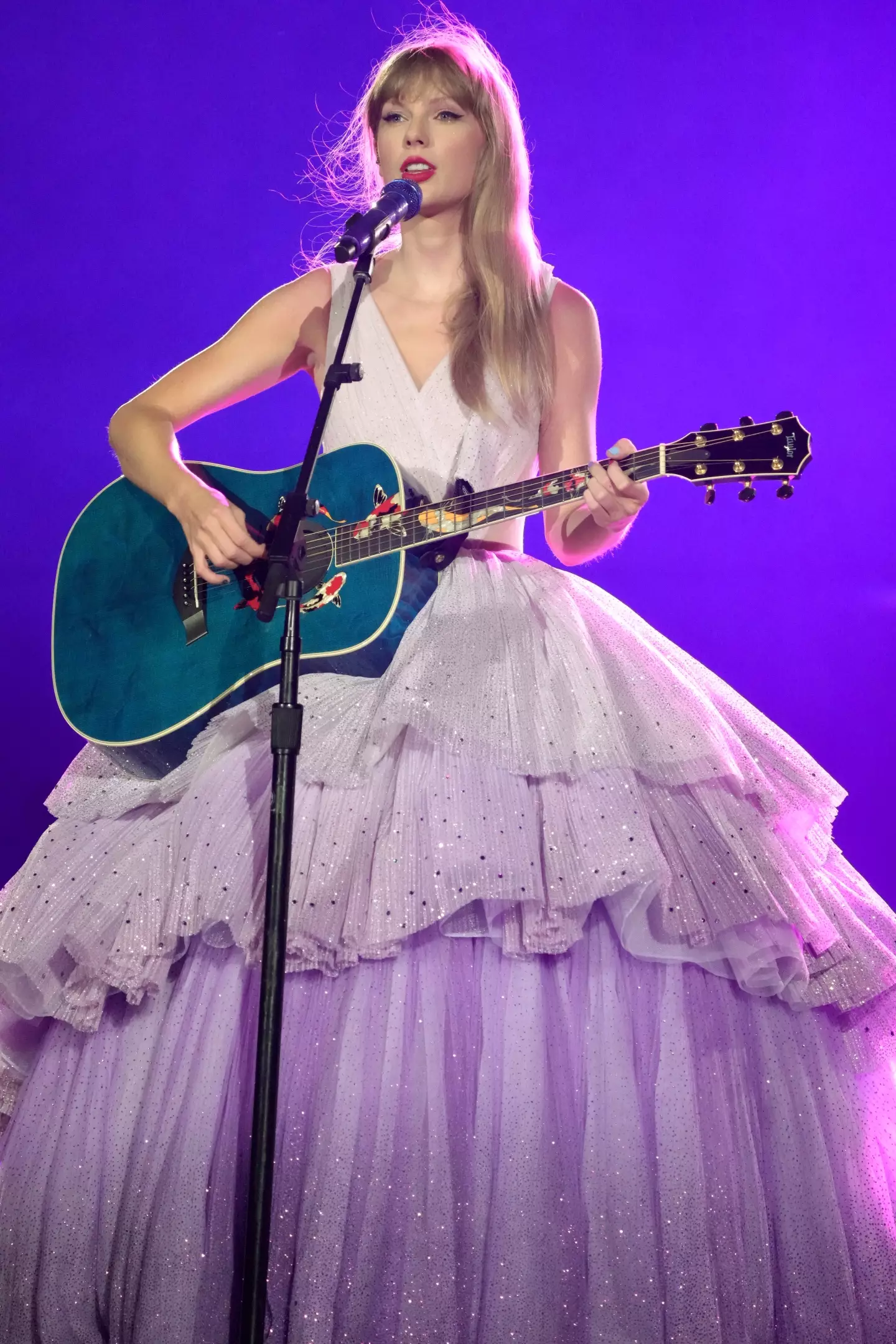 Taylor Swift is performing in her Eras tour.