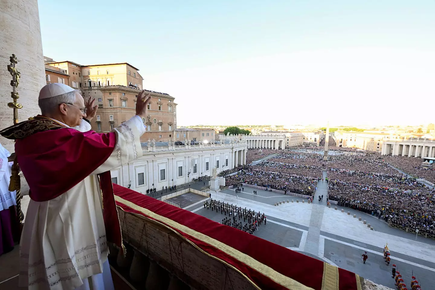 Pope Leo pictured waving to the masses from his balcony at the Vatican City (Francesco Sforza - Vatican Media via Vatican Pool/Getty Images)