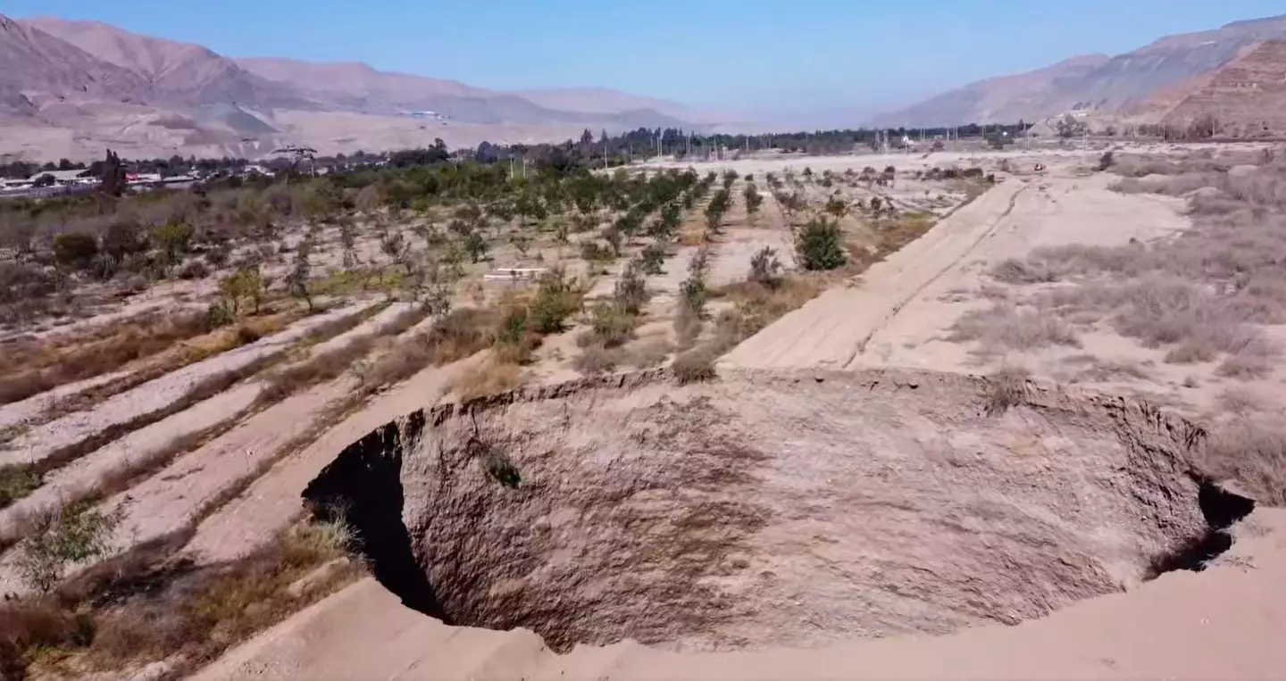 The mysterious sinkhole, which currently stands at 82-foot-wide, close to the giant Alcaparrosa copper mine.