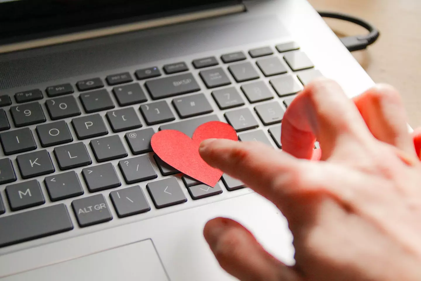 The scammers made promises about a romantic relationship (Kinga Krzeminska / Getty)