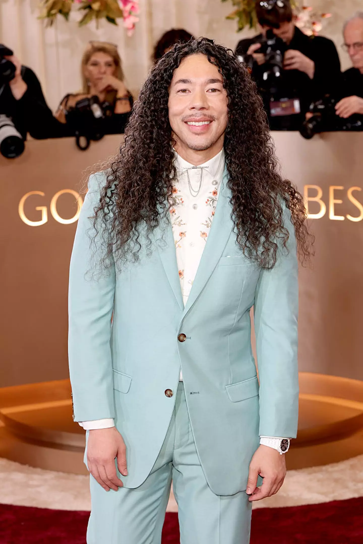 Cole Walliser is often seen on the red carpet with his famous Glambot (Monica Schipper/Getty Images)