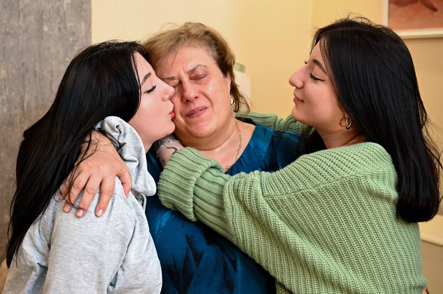 The twins were reunited after being separated. (VANO SHLAMOV/AFP via Getty Images)