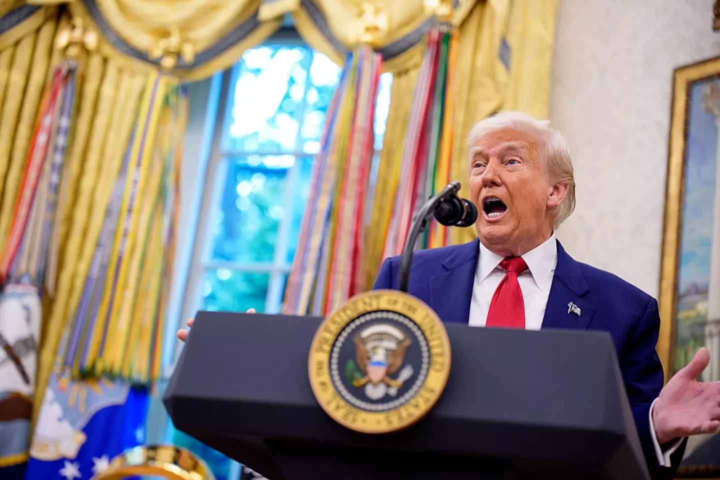 Trump defending his buddy as a 'fantastic guy' (Andrew Harnik/Getty Images)