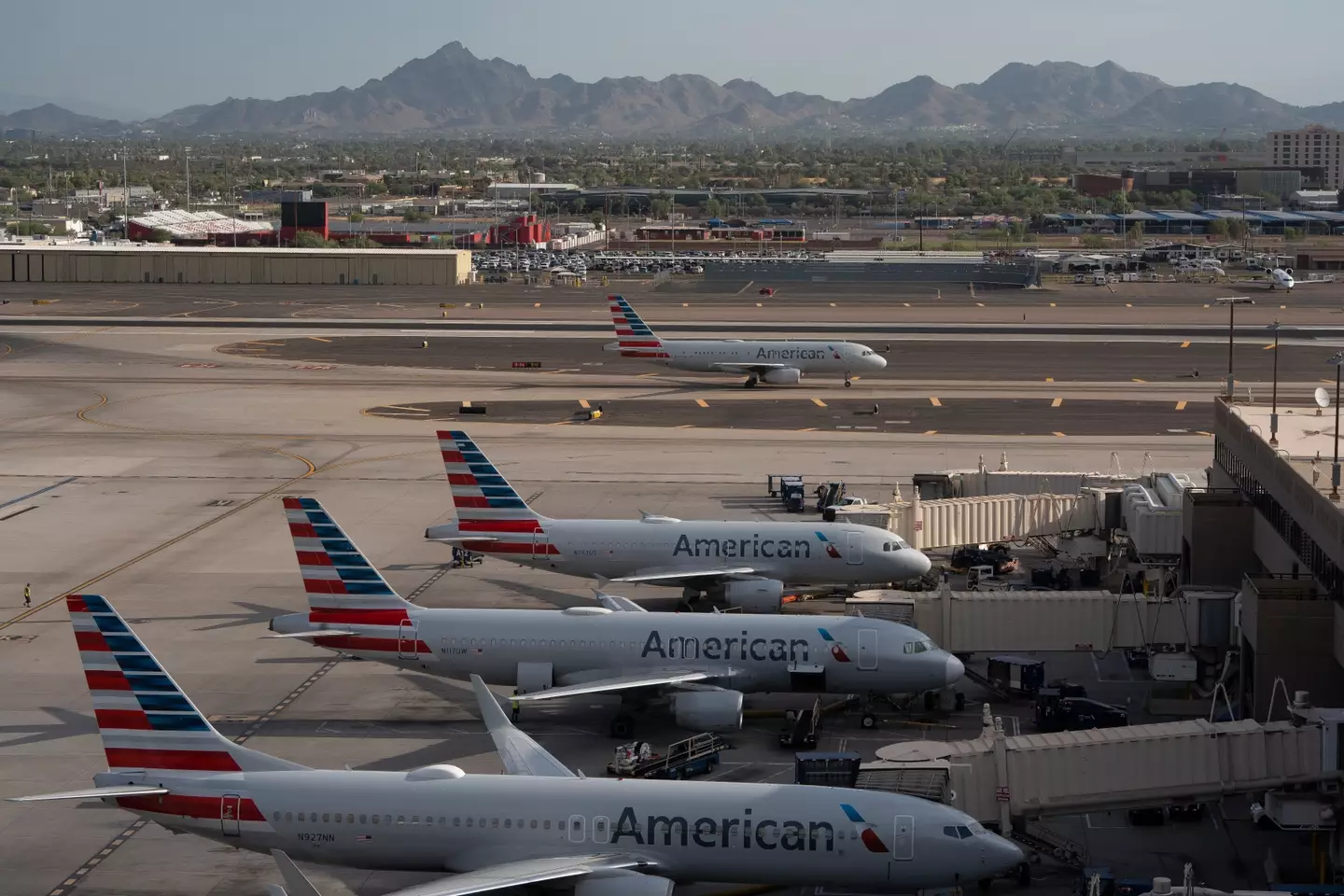 The teenager's family say he's been banned by American Airlines for three years for skiplagging.