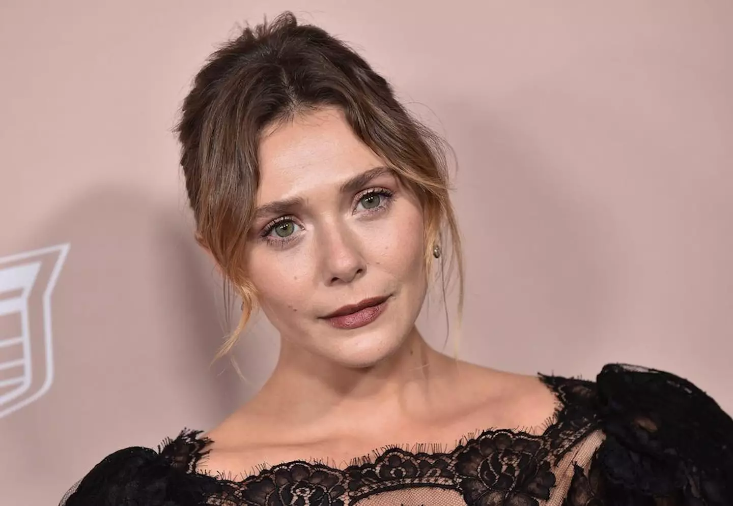 People think the demonic doll bears an uncanny resemblance to Elizabeth Olsen.
