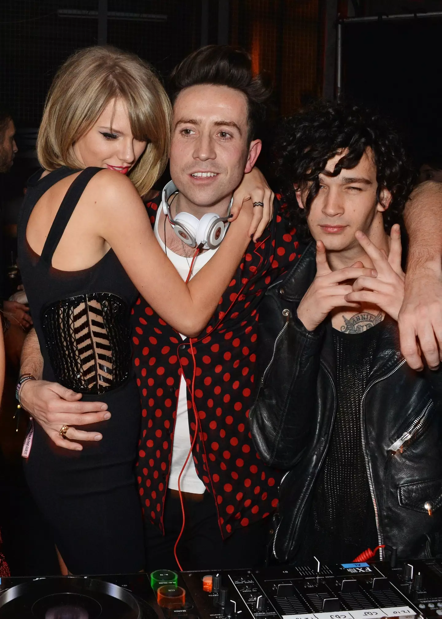 Swift and Healy seen with radio DJ Nick Grimshaw in 2015. (David M. Benett/Getty Images for Soho House & Bacardi)