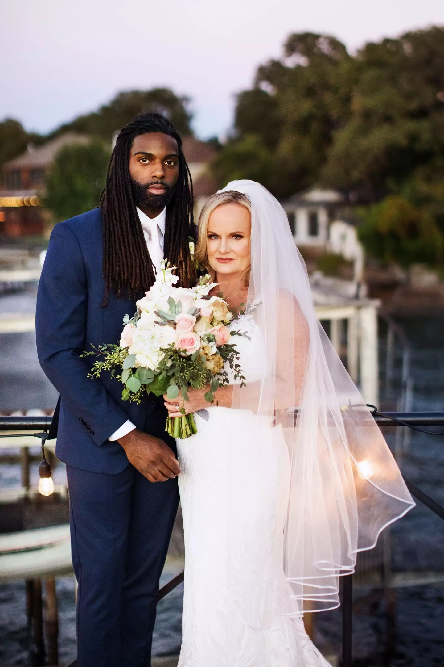 The couple tied the knot with fireworks and a boat ride across a lake.