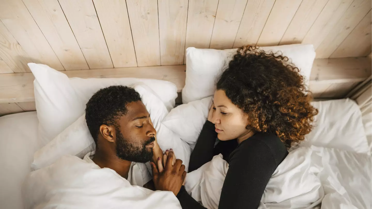 Woman reveals unusual sleeping arrangement with boyfriend that's leaving people divided