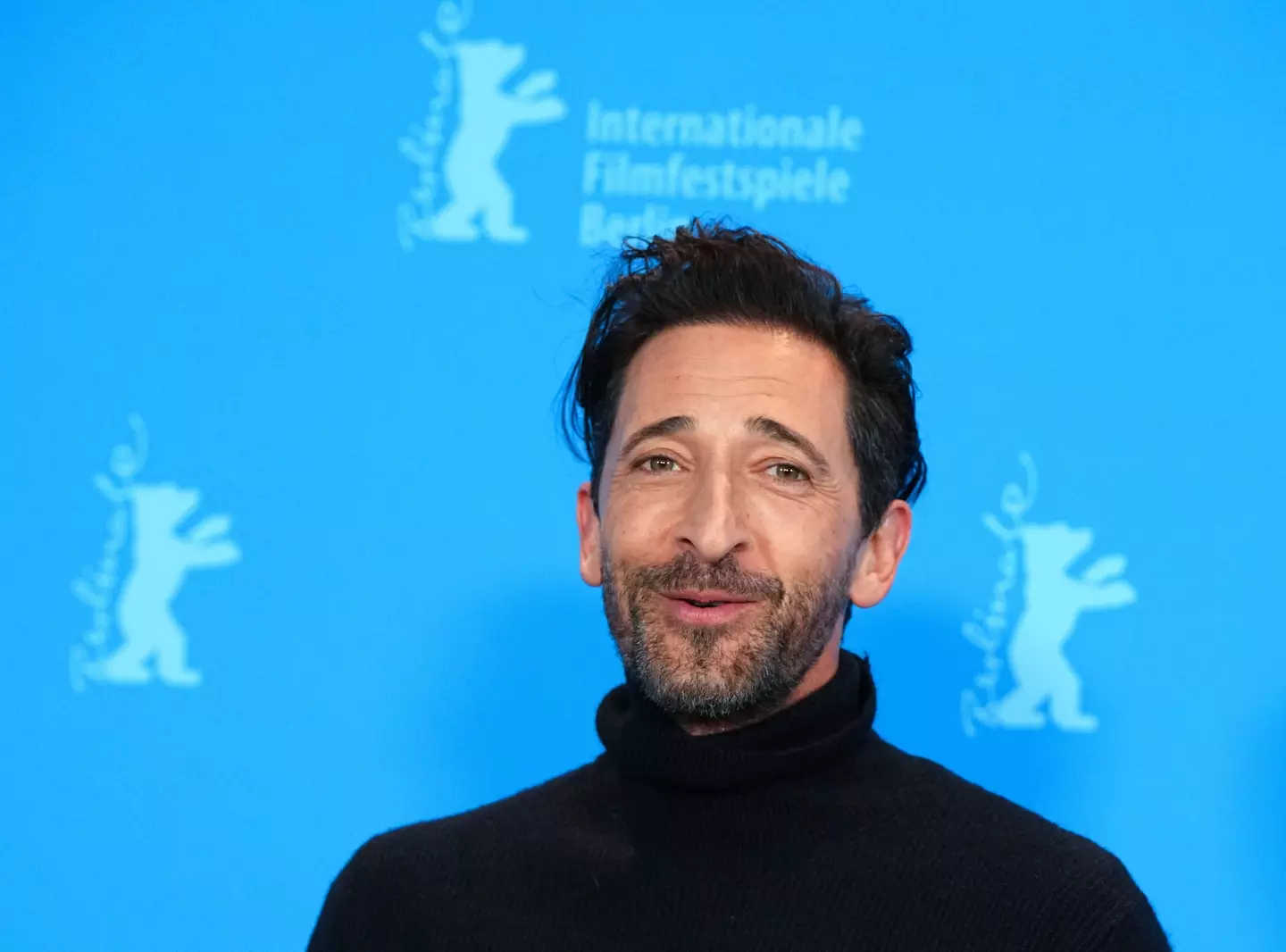 Adrien Brody kissed Berry on stage.