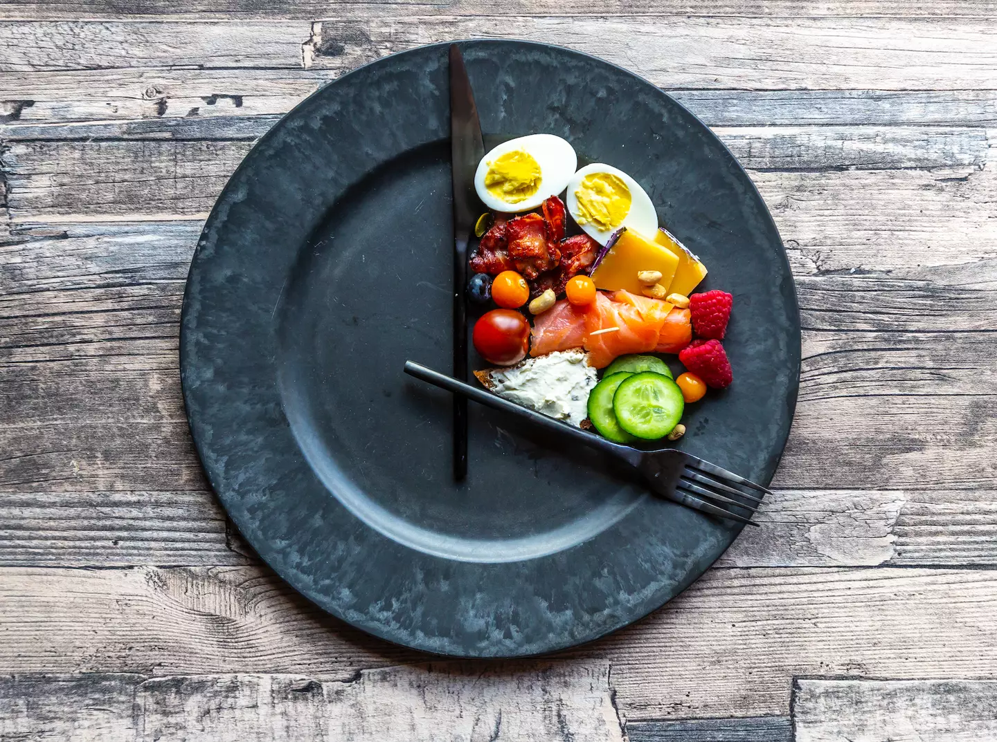 There remains a debate between scientists on the benefits of intermittent fasting (Getty Stock Image)