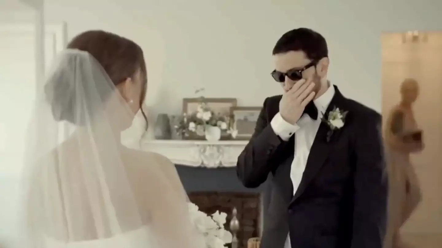 Kim is visible in the background of the video (YouTube/EminemMusic)