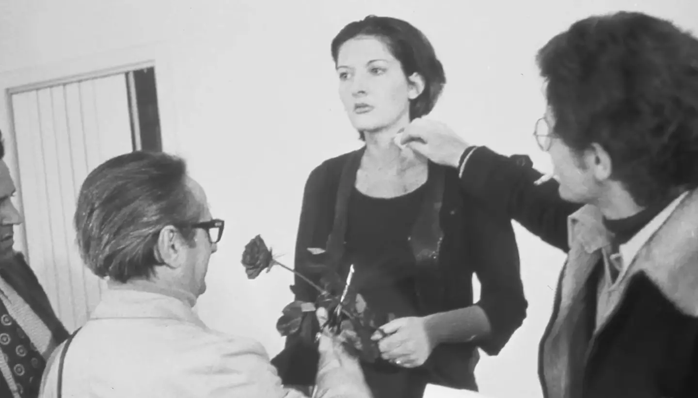 One person cut the artist. (Marina Abramović Institute/YouTube)