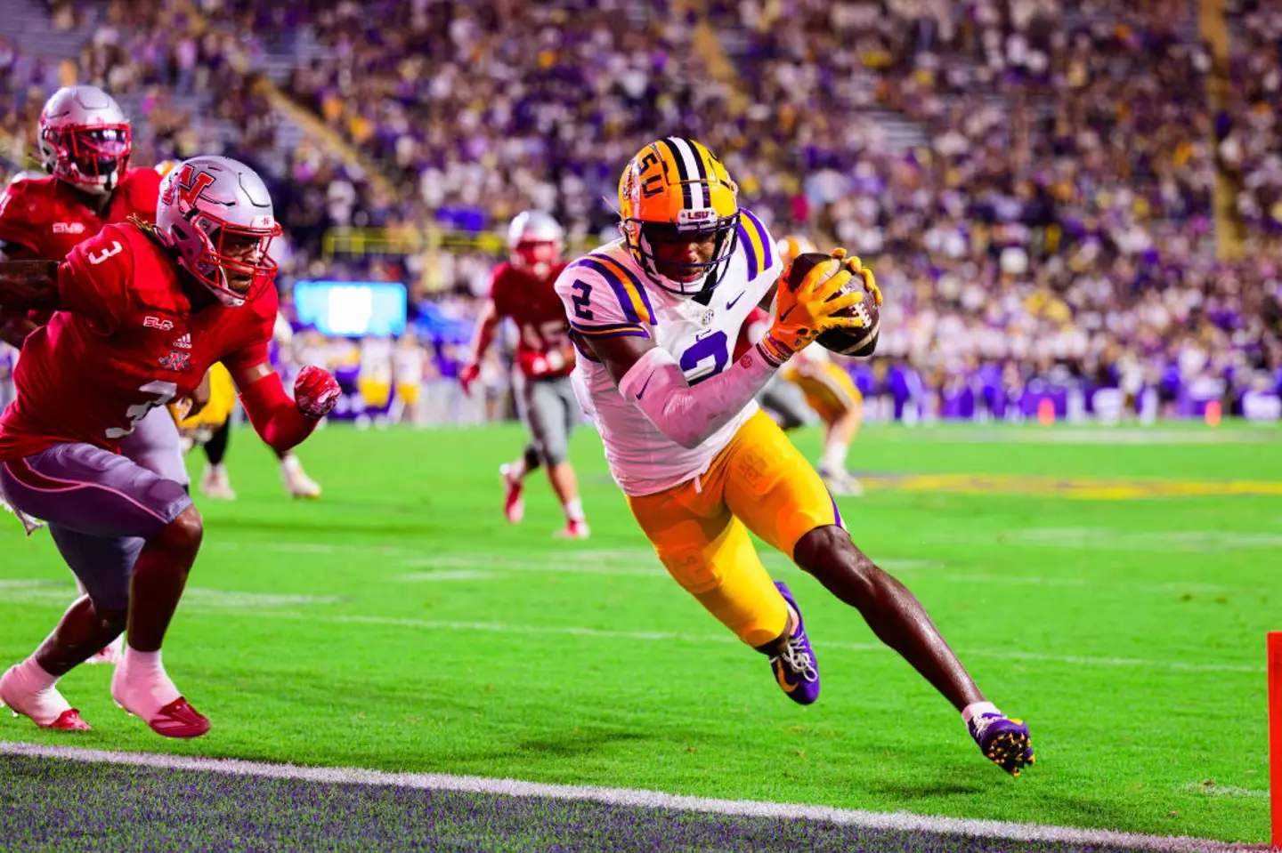 Lacy, of LSU Tigers, scores a touchdown during the game against the Nicholls State Colonels at LSU Tiger Stadium in September (LSU Athletics/University Images via Getty Images)
