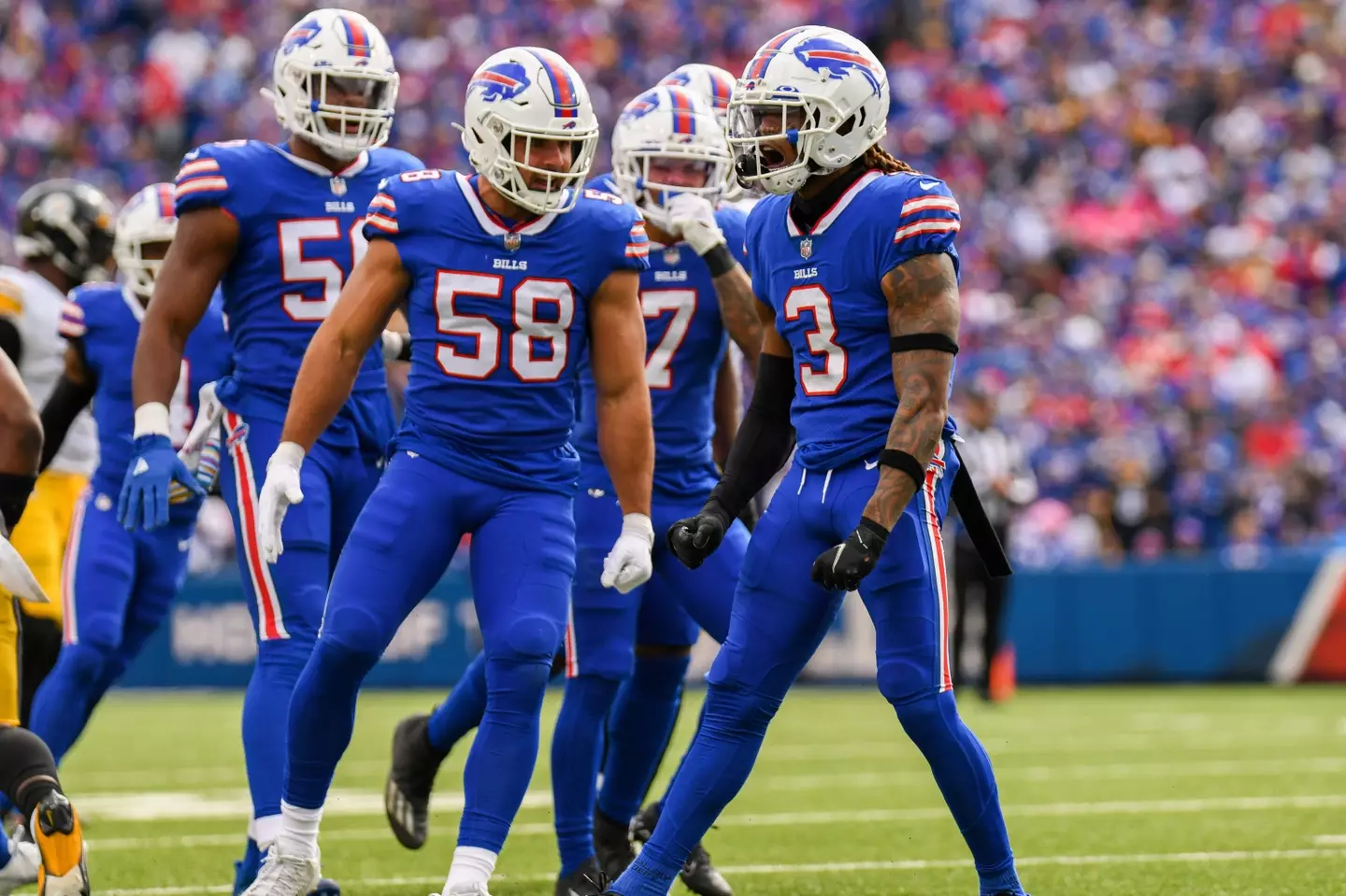 Damar Hamlin (right) has had a 'remarkable improvement', though he is still 'critically ill'.