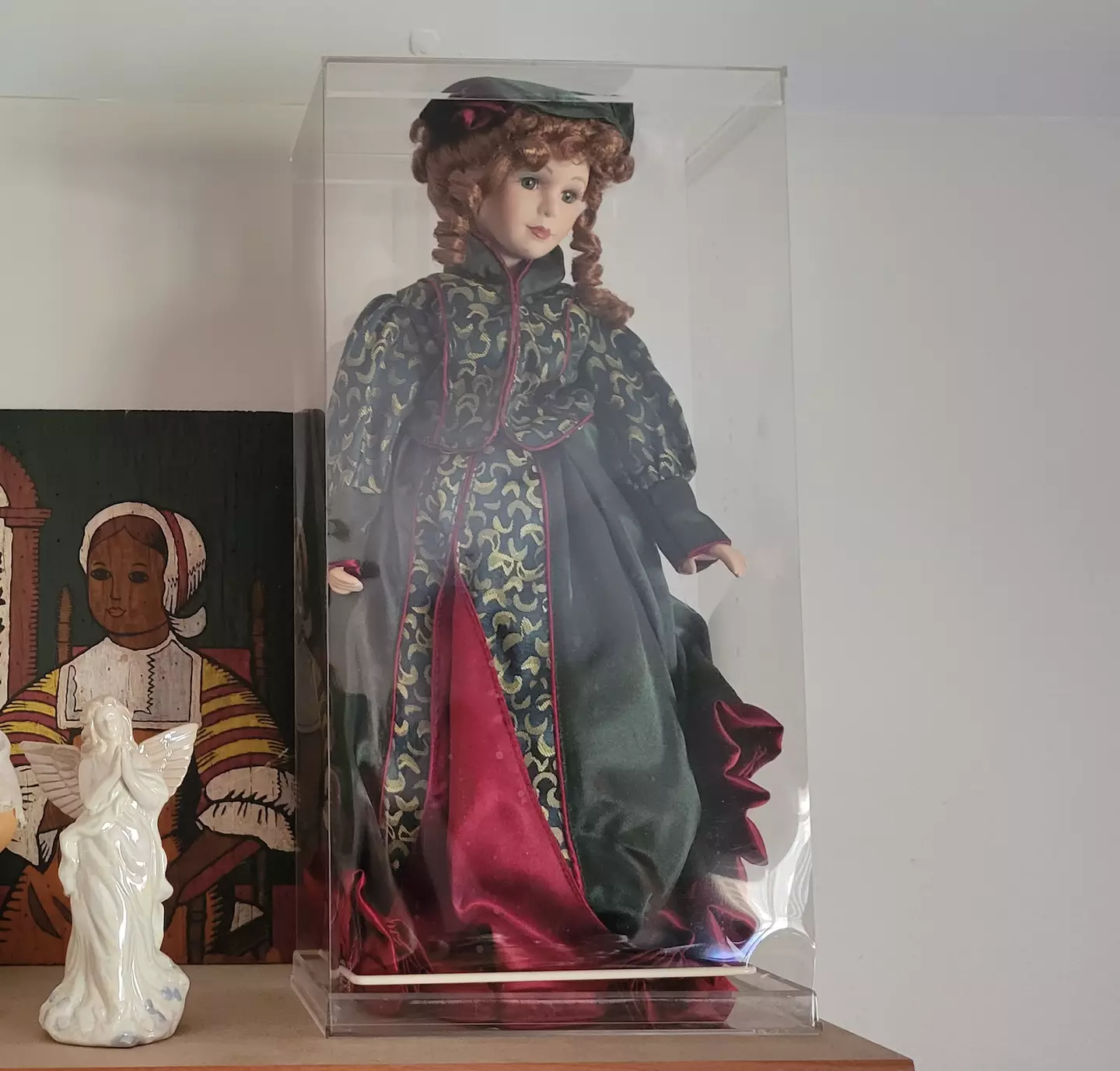 The allegedly demonic doll is now blessed and kept in a see-through case.