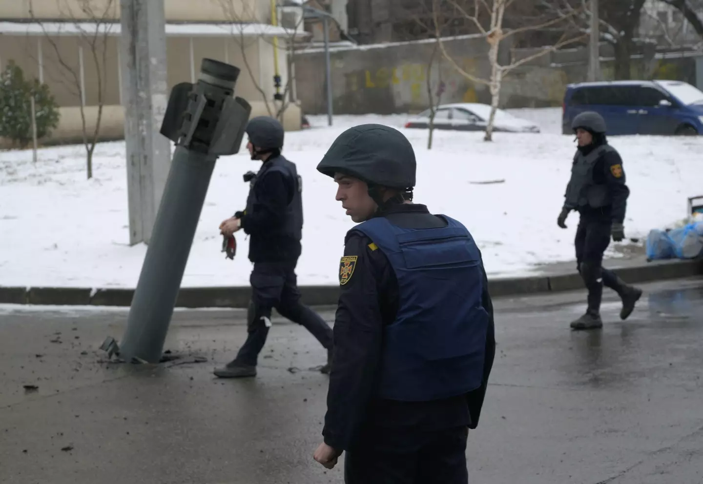 A rocket case embedded in the road in Kharkiv (Alamy)