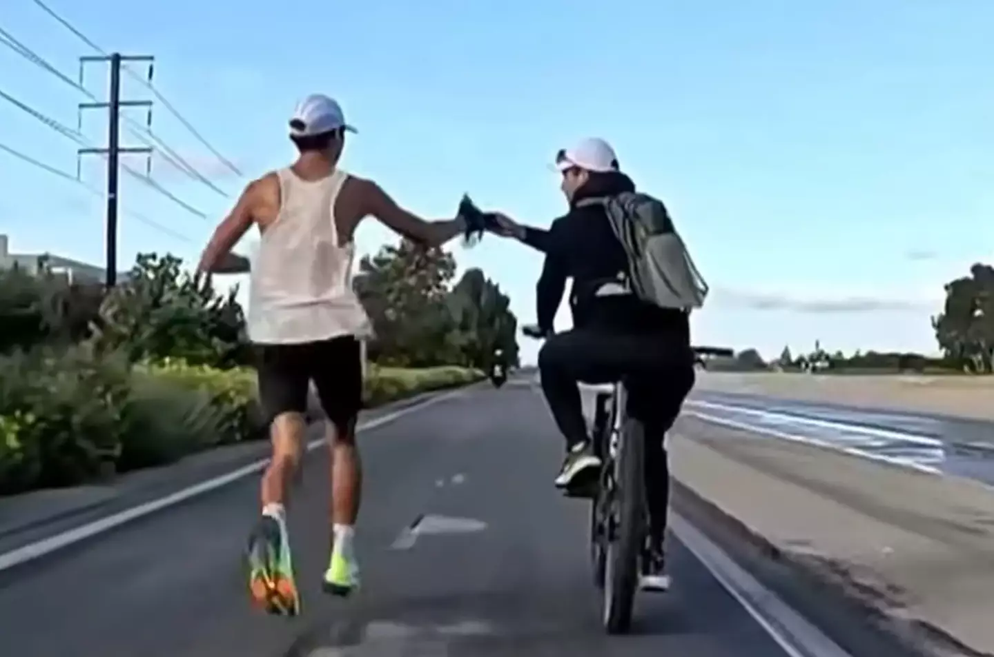 Prado's father was seen offering some water. (NBC 4/OC Marathon)