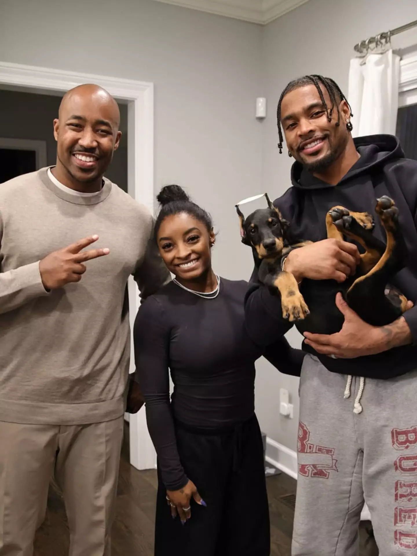 Olympian Simone Biles and her American football-playing husband have seemingly purchased a new pooch (Instagram/regalempiredobermans)