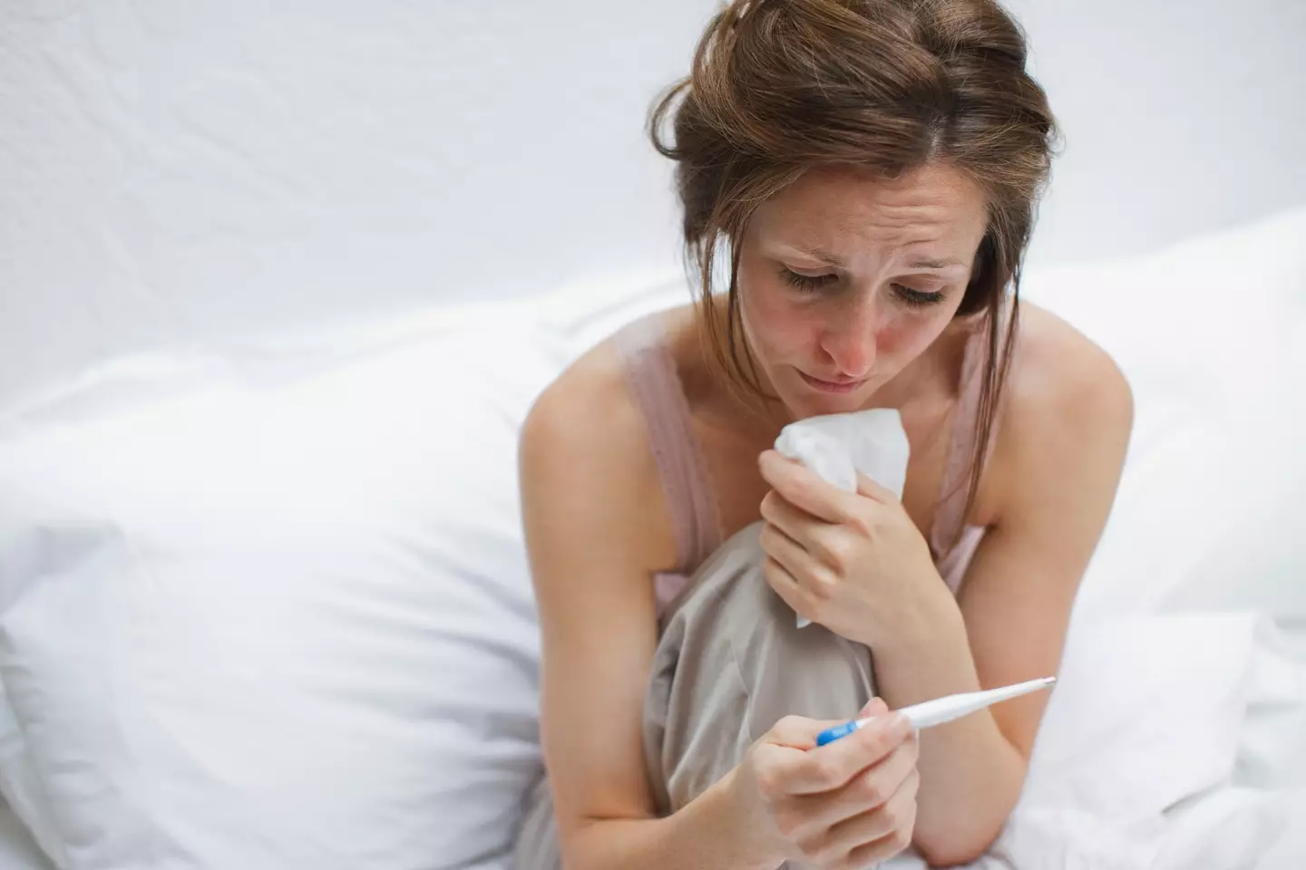 A high fever can be a sign of bird flu (Tom Merton/Getty Images)