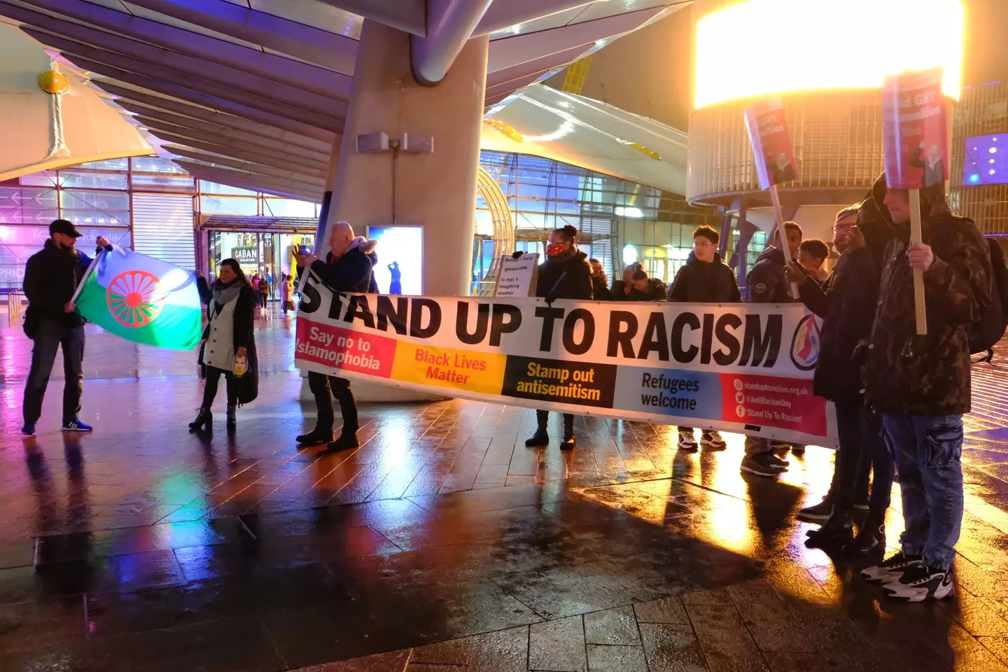 Protesters gather outside of Jimmy Carr's gig in London after Holocaust joke. (Alamy) 