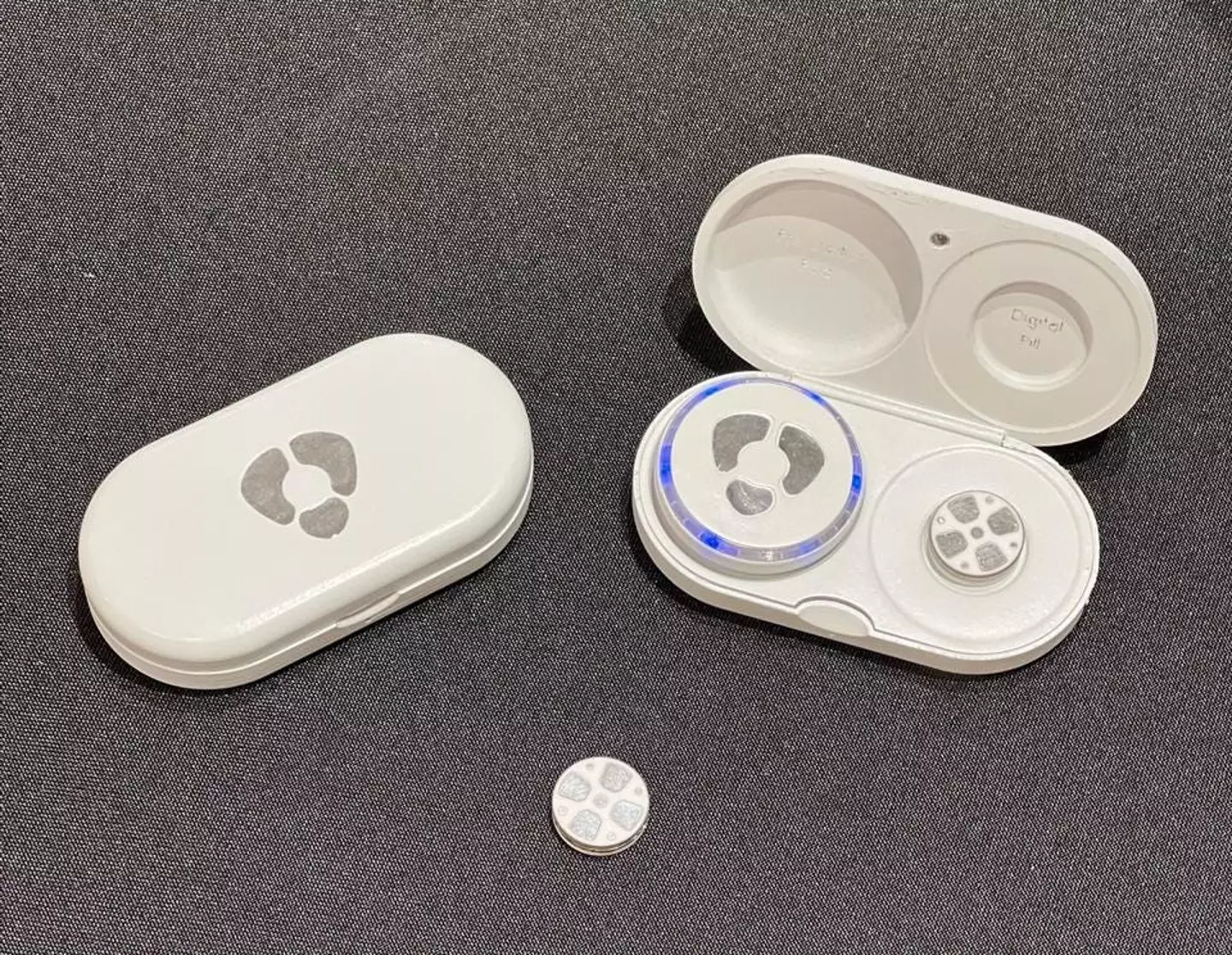 The device is about the size of a penny.