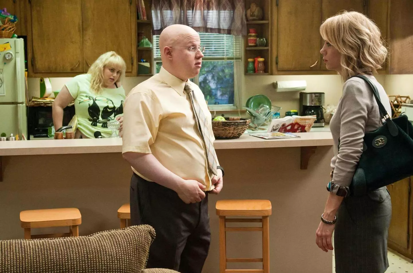 Rebel Wilson alongside Matt Lucas and Kristen Wiig in Bridesmaids.