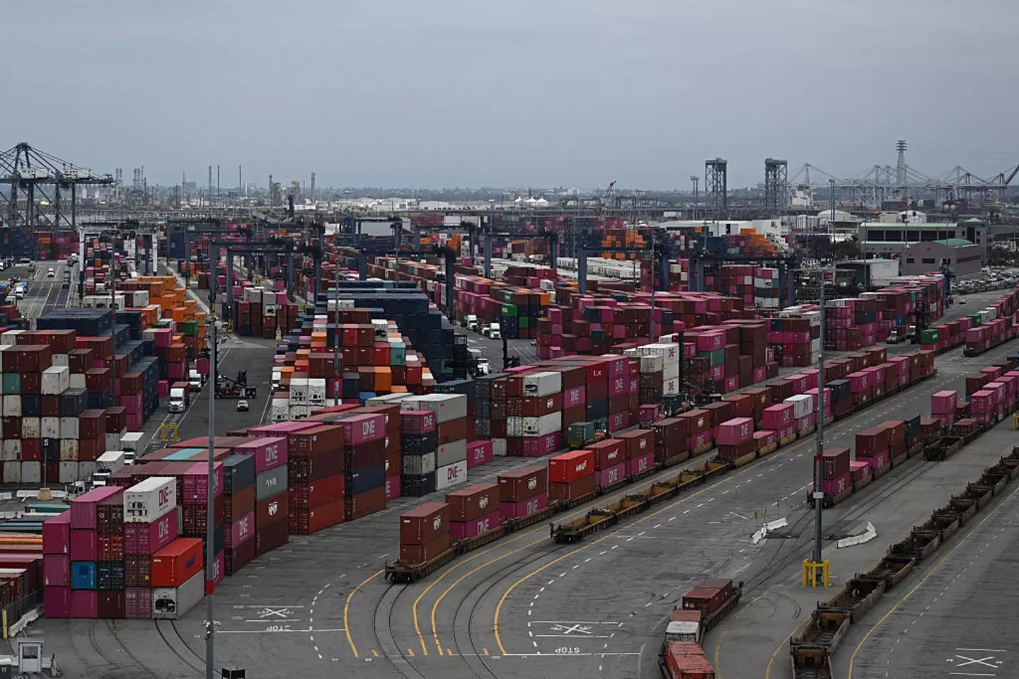 Shipping containers sit stacked on trains at the Port of Los Angeles in San Pedro, California (PATRICK T. FALLON/AFP via Getty Images)