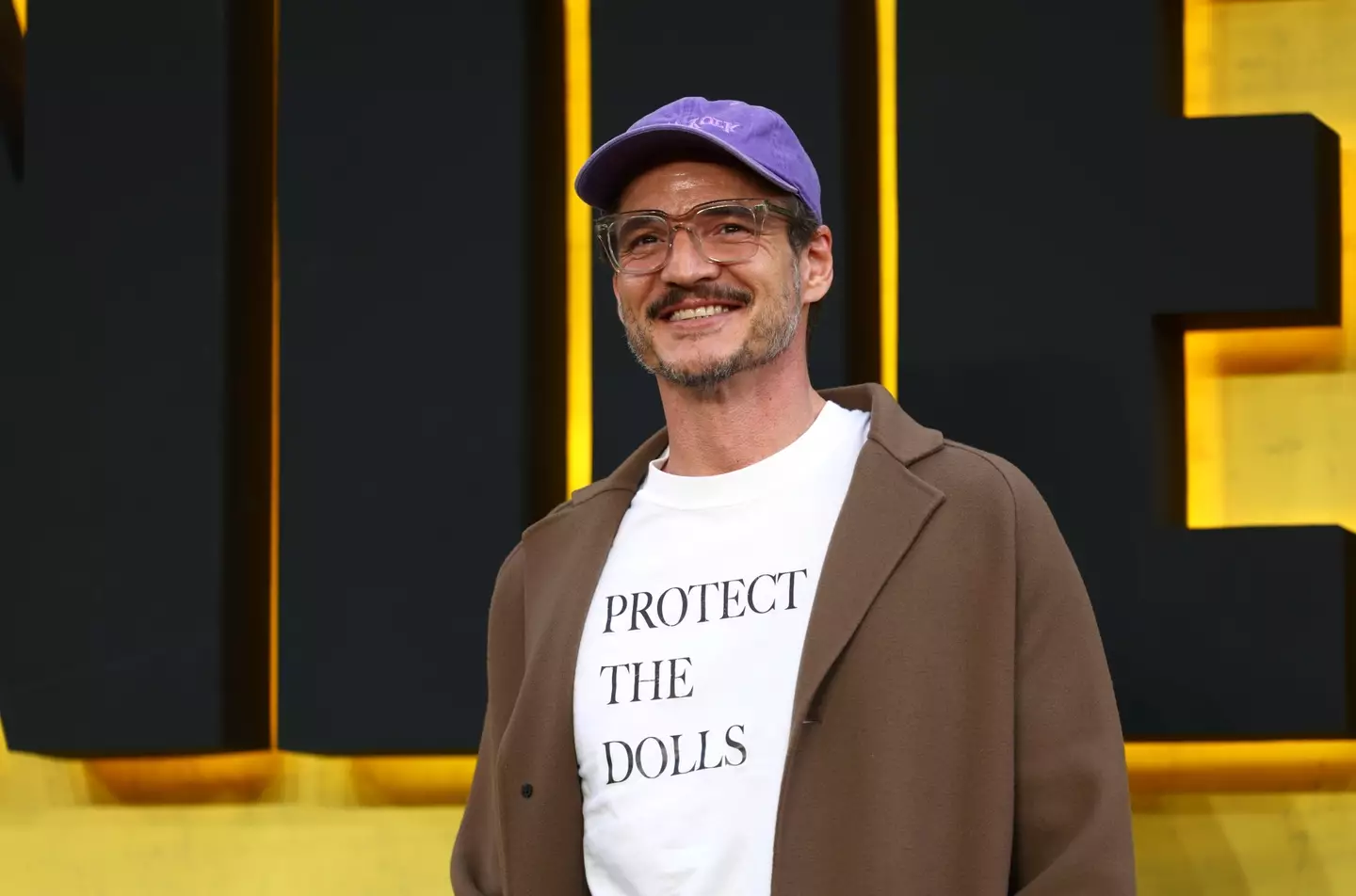 Pedro Pascal seen wearing a 'Protect The Dolls' t-shirt (Tim P. Whitby/Getty Images for The Walt Disney Company Limited)