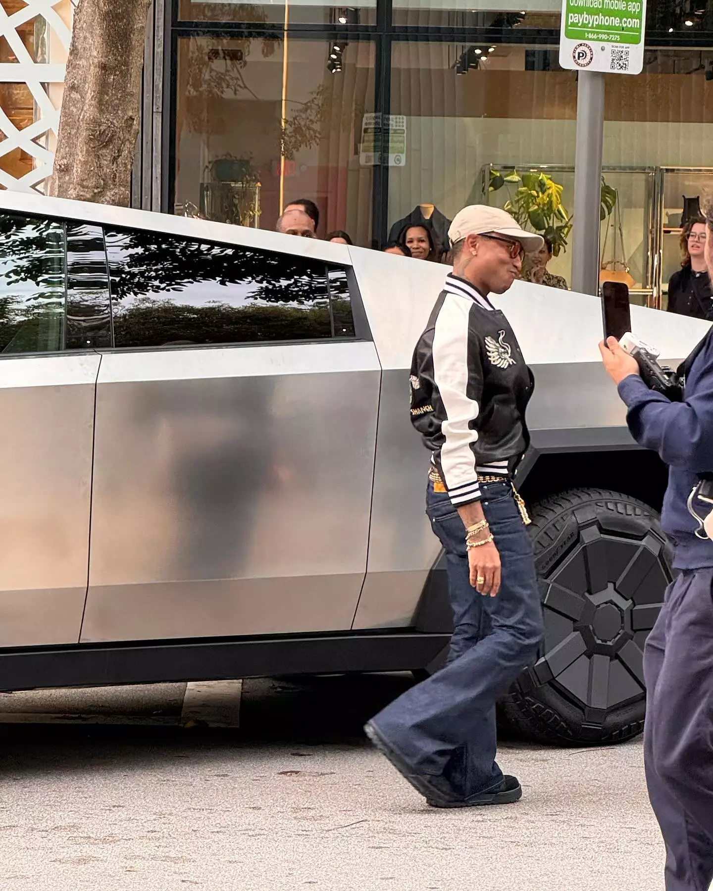 Pharrell cut it close to hitting the other car.