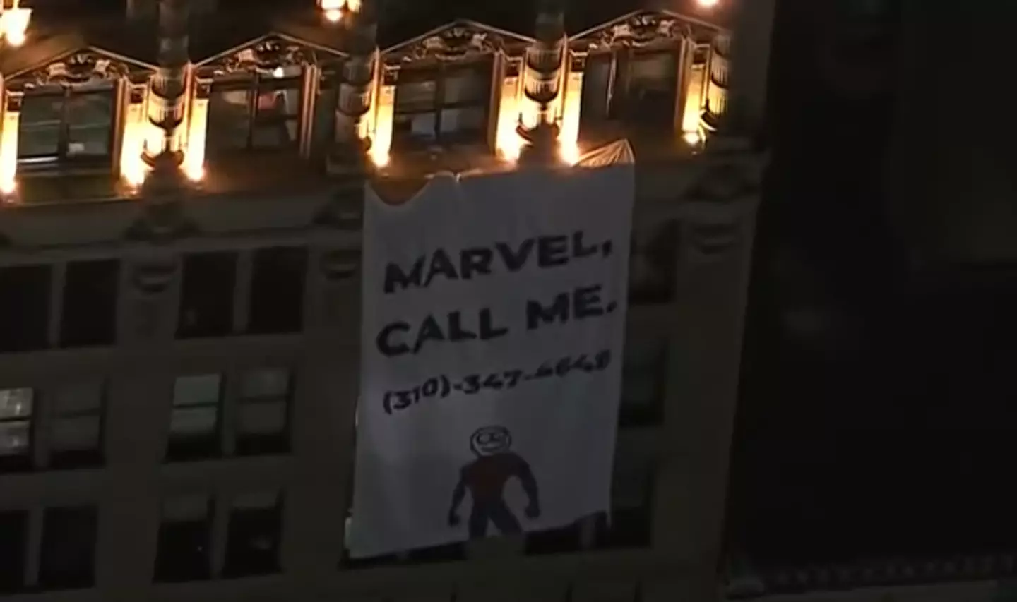 The pair's banner to Marvel (KTLA 5)