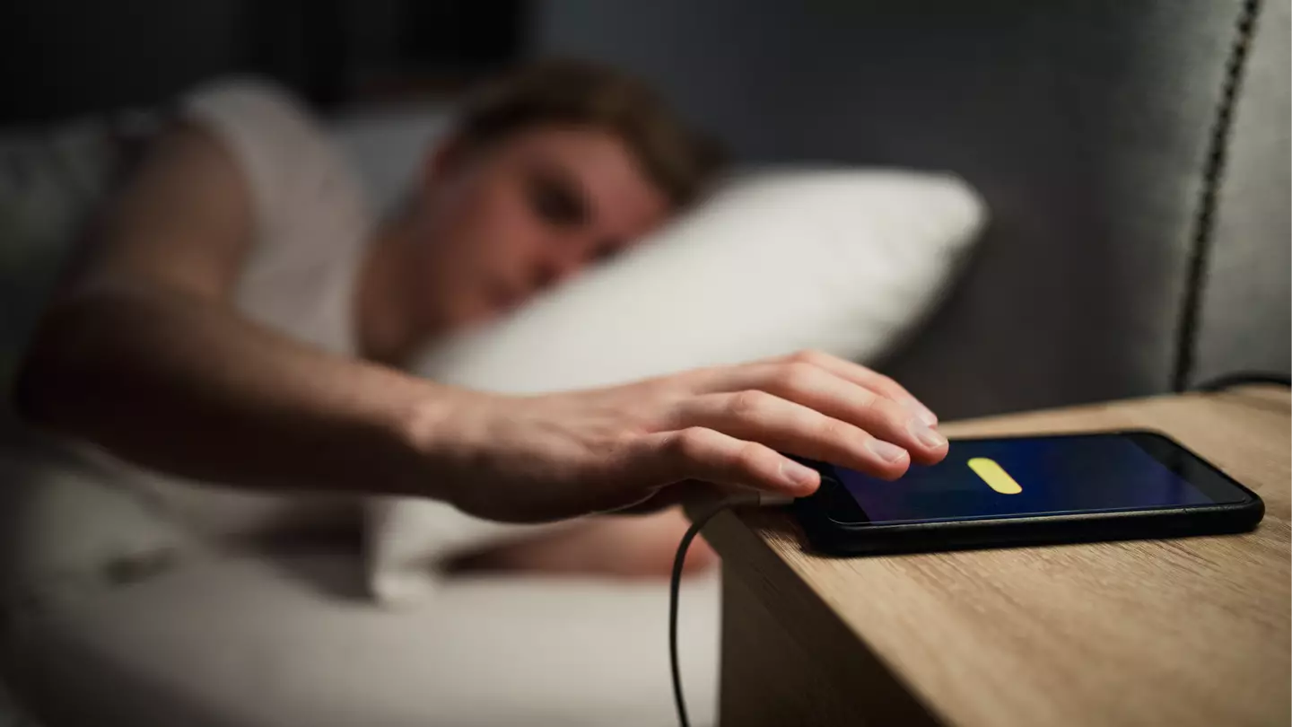 Experts reveal why you should never hit snooze on your alarm and the devastating effects it can have on your body