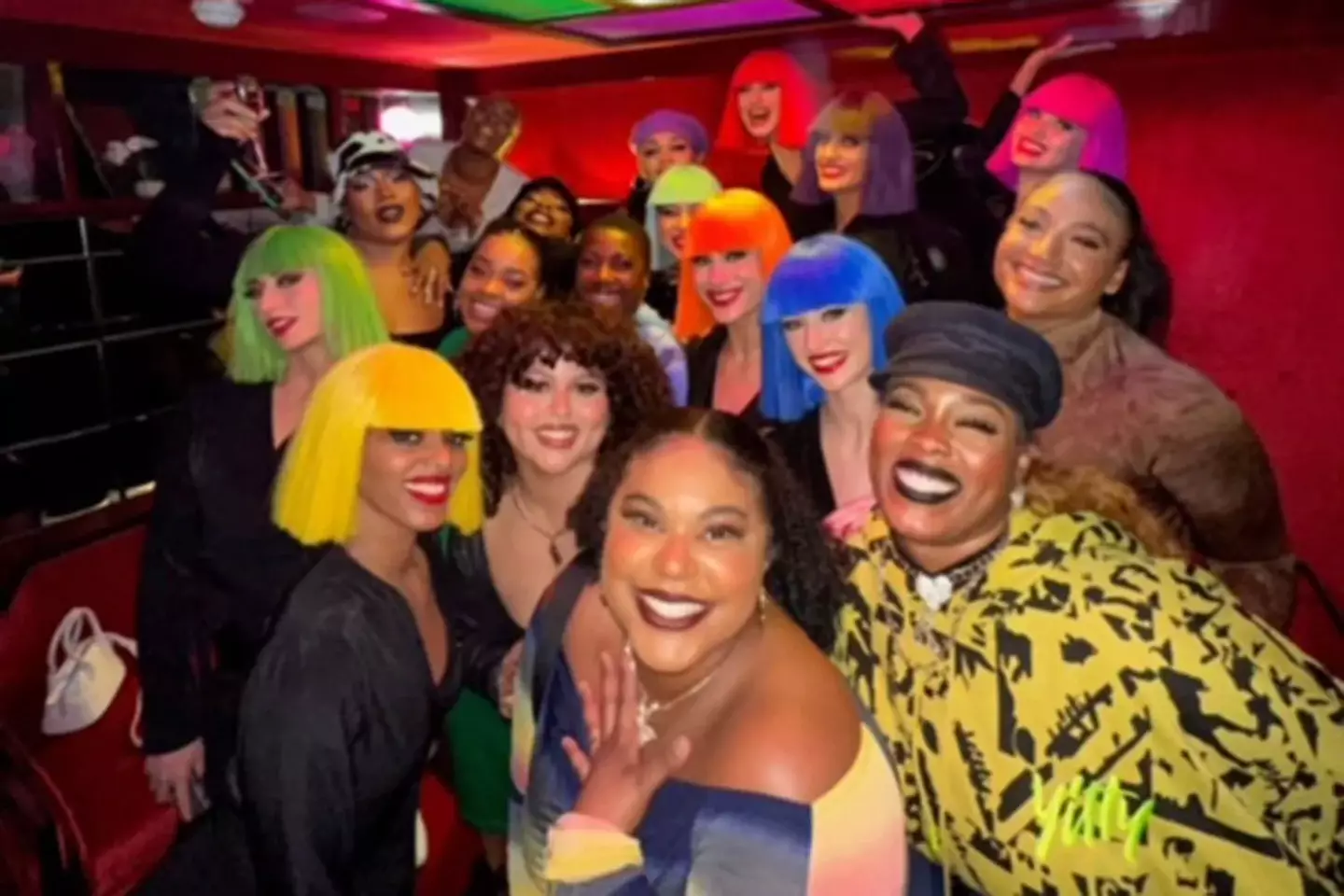 Lizzo's lawyer says this picture shows two of the dancers that are suing her 'enjoying themselves'.