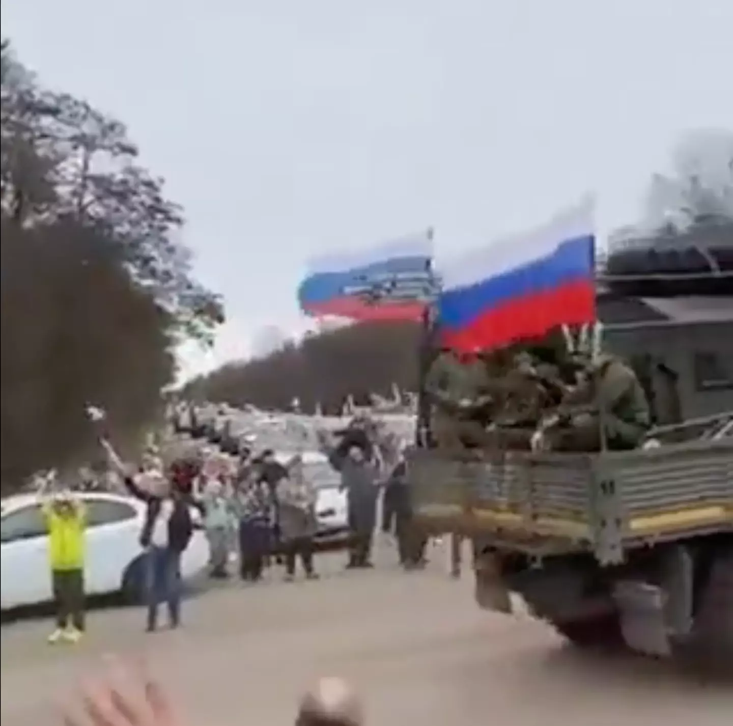 Crowds of people gather to wave off Russian troops on their way to fight in Putin's 'special military operation' in Ukraine.