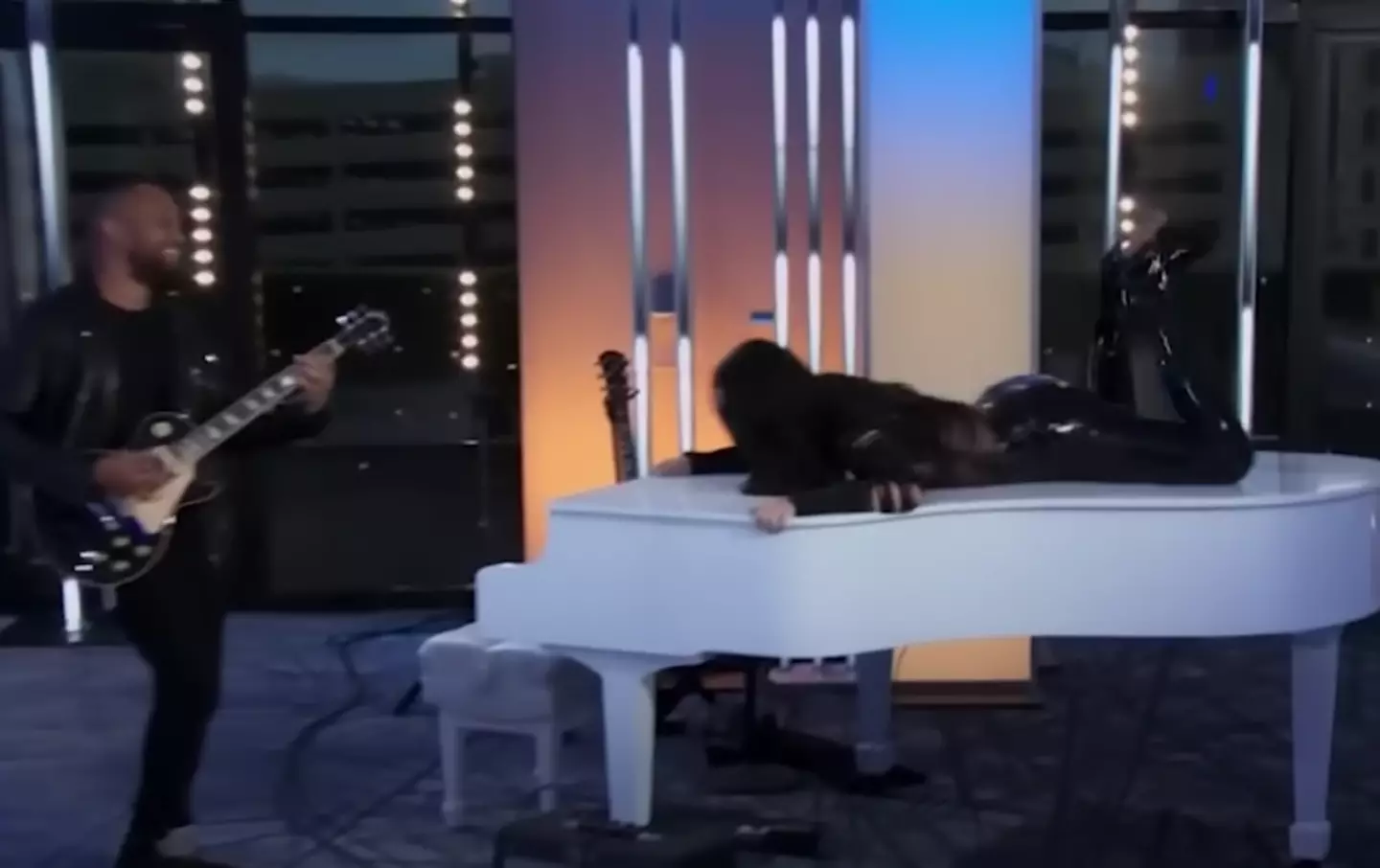 Katy Perry took to the top of the piano during a contestant's performance on American Idol.