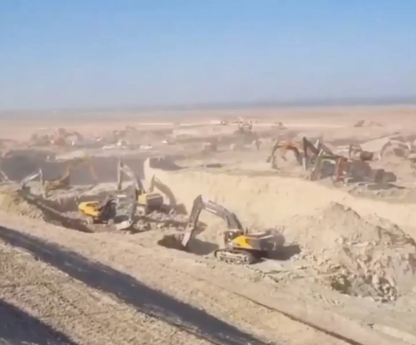 A sea of excavators at work.