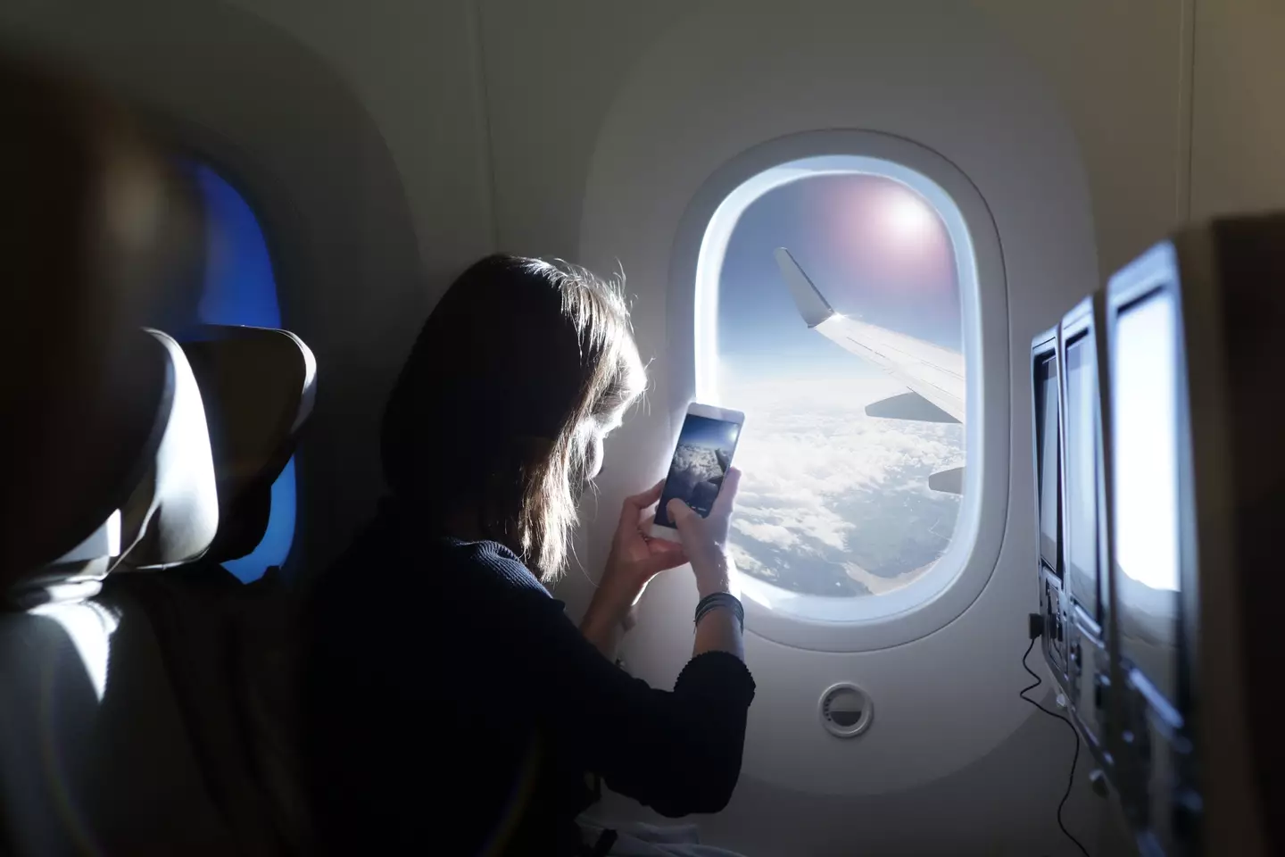 There's a few reasons an airline may ask you to turn your phone off. Credit:Peter Cade/Getty