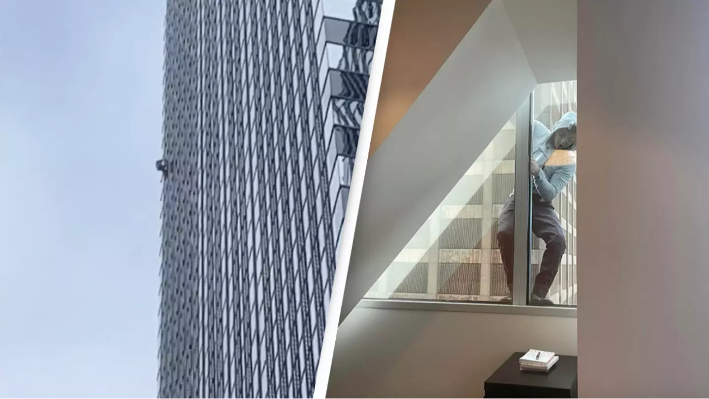 Office workers shocked as they suddenly spot free climber at 15th floor window
