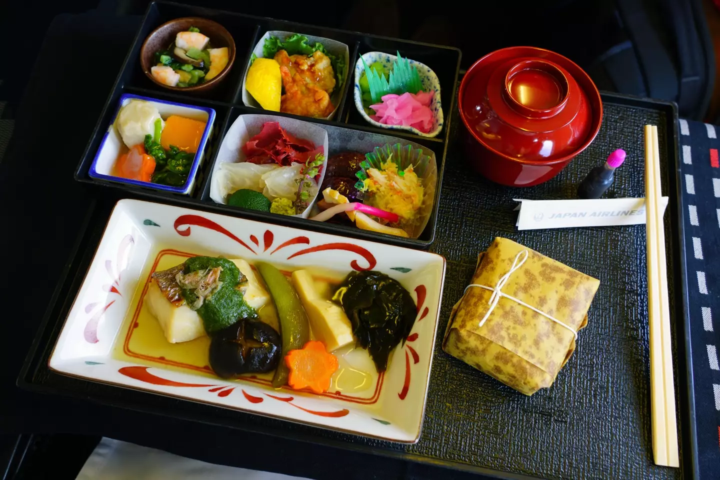 A meal served in First Class on a Japan Airlines flight, but passengers can now opt out of having a meal as part of their journey.