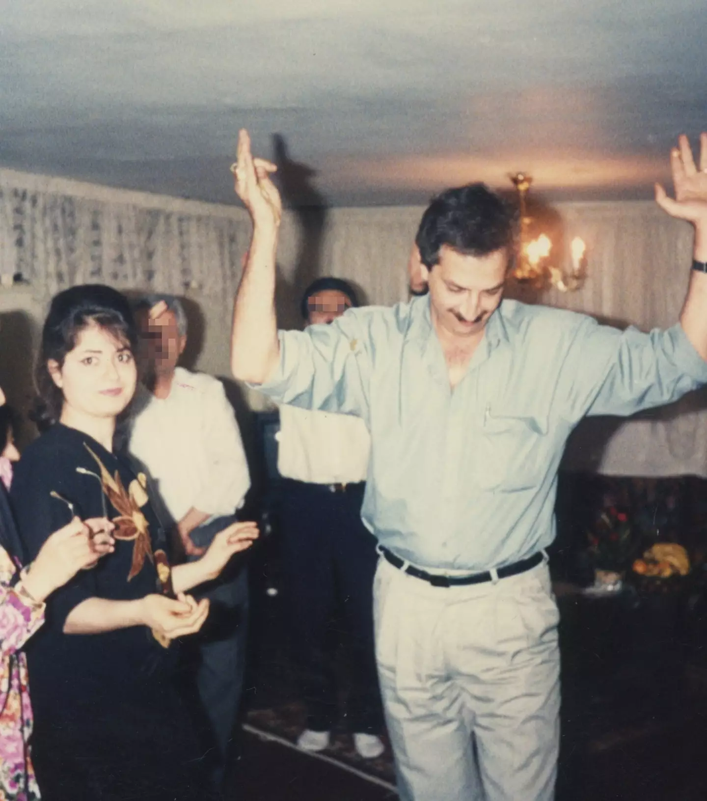 Sahar's parents at a house party. Such gatherings are strictly prohibited by the morality police.