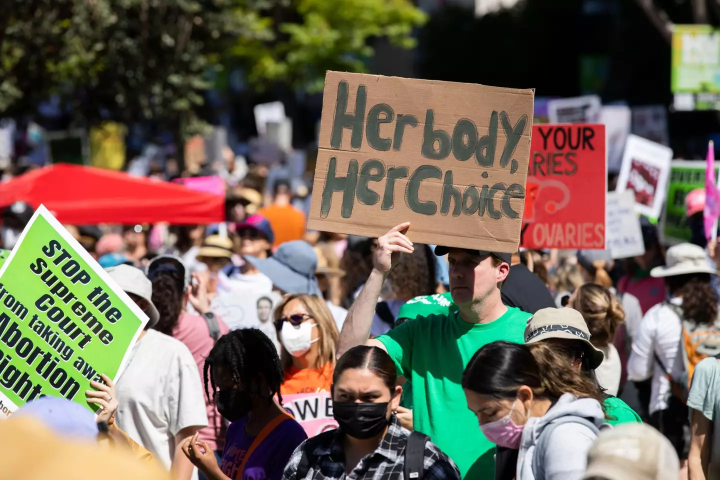 Activists protest against the Supreme Court's ruling to overturn Roe v Wade.