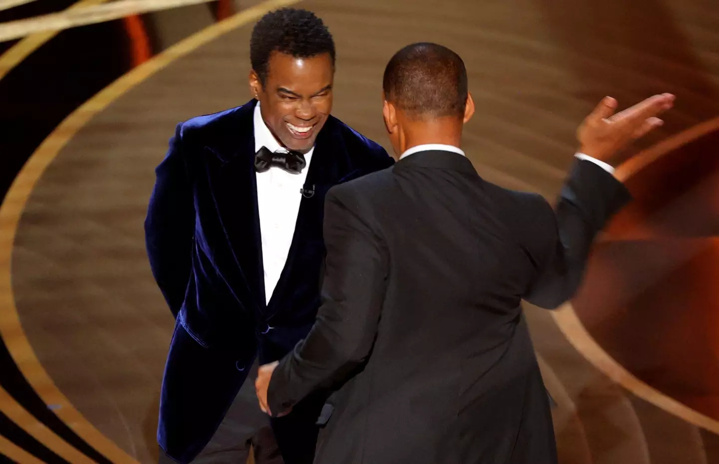 Will Smith slaps Chris Rock on stage during the 94th Academy Awards.